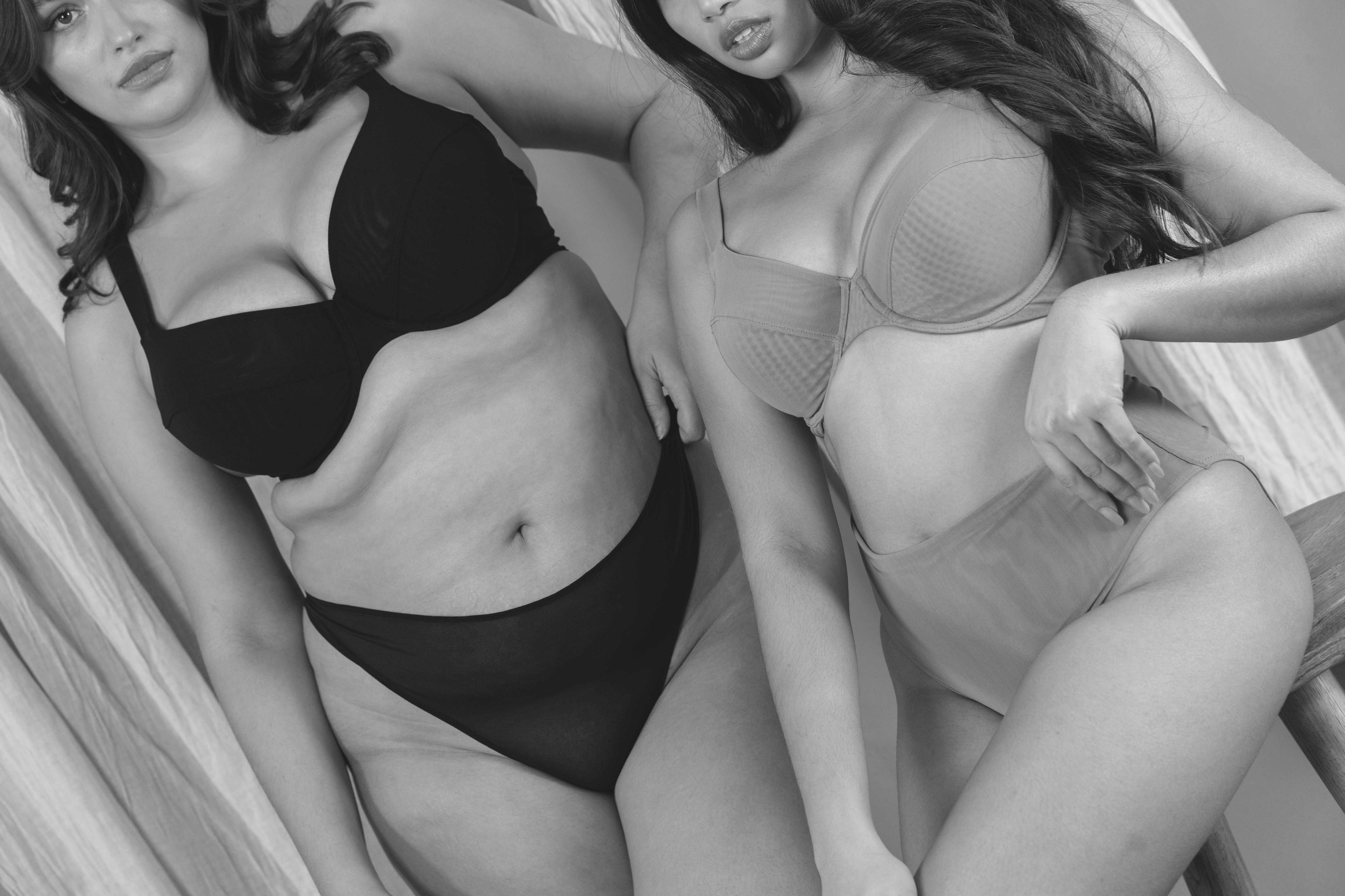 MARVELL LANE image of two models wearing the Busty Basics Plunge Bras and Briefs
